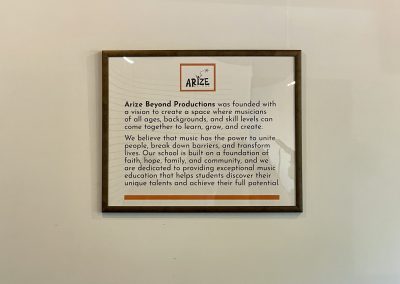 Arize Beyond Mission Statement Plaque in School of Music