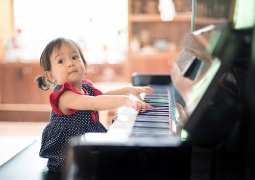 Baby playing piano