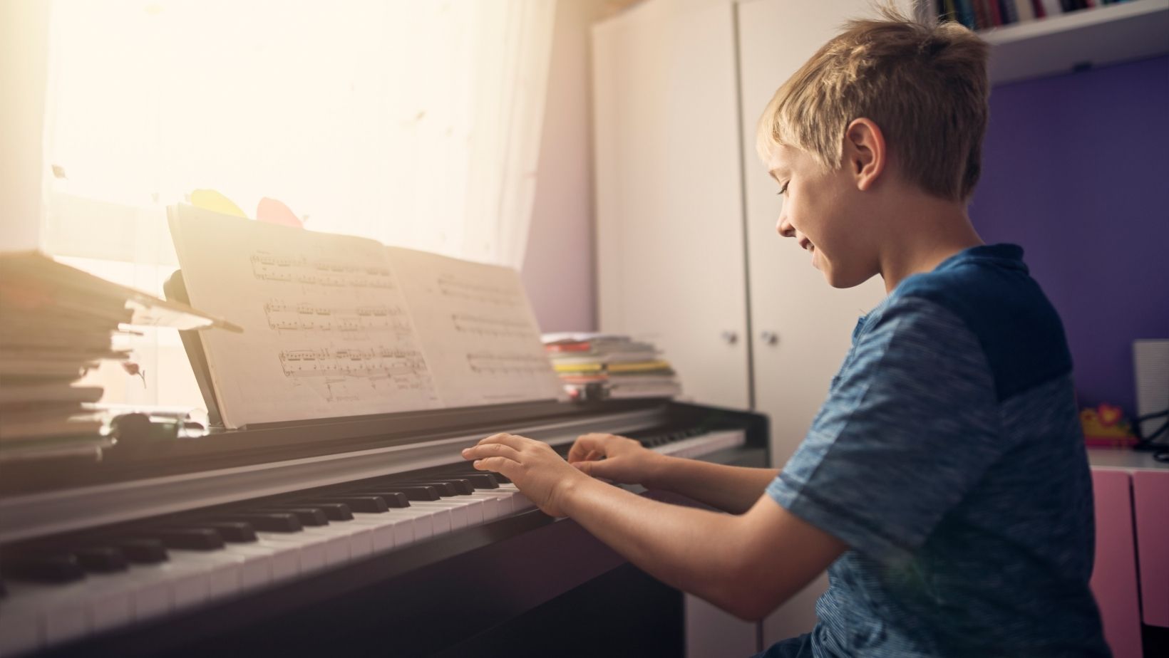 Beginning Child Playing a Digital Piano